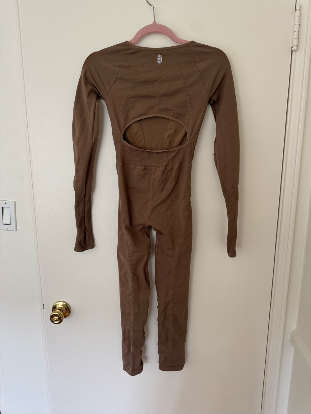 FP Movement Good Karma brown long sleeve jumpsuit with cutout back
